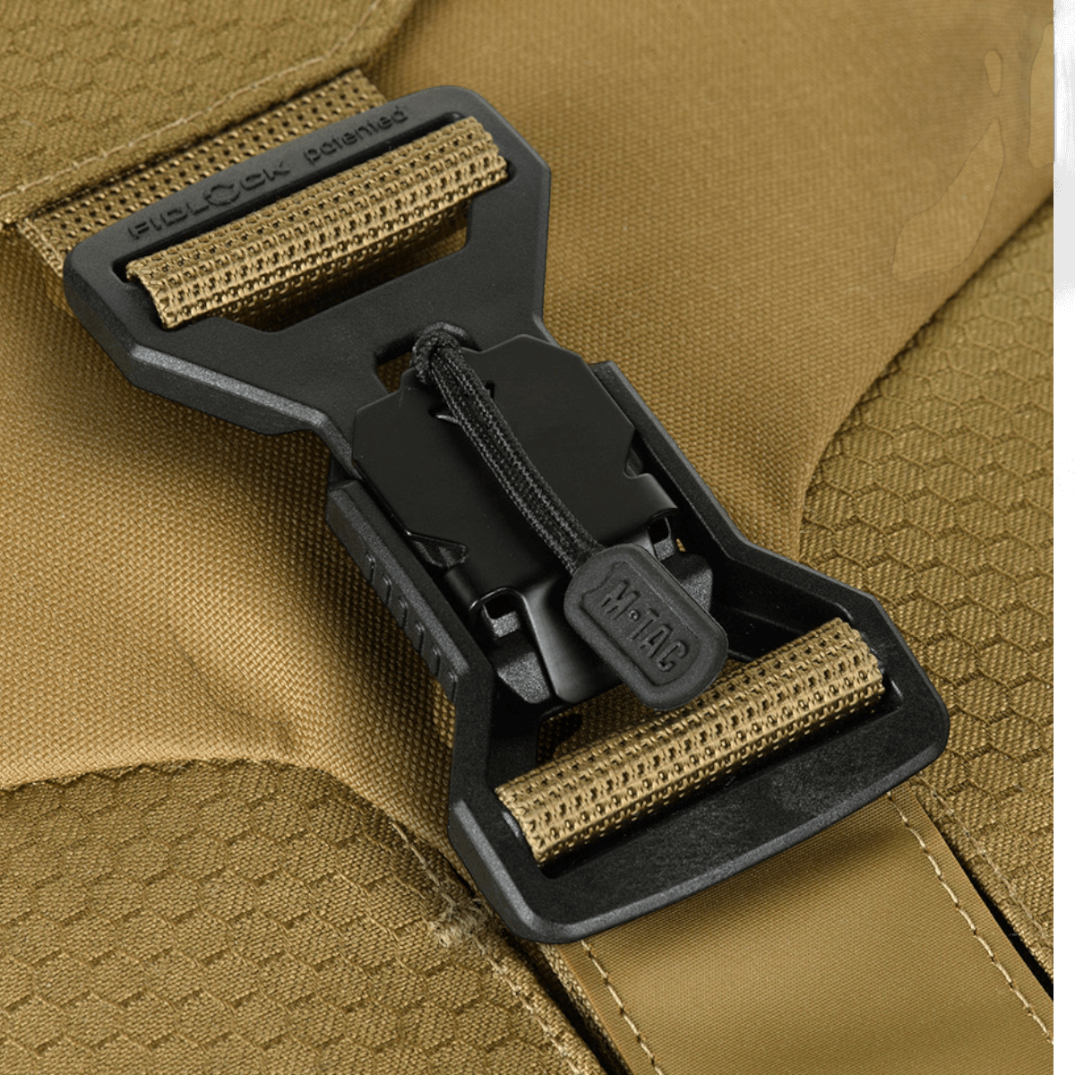 FidLock-suljin M-Tac Magnet XL Taske Elite Hexissä.