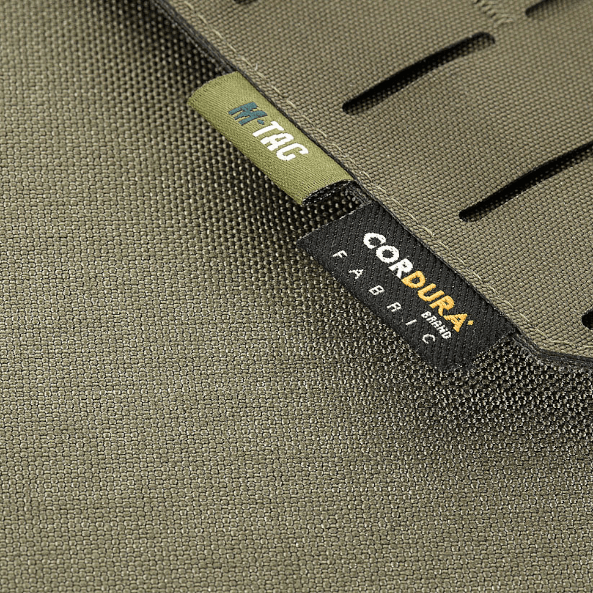 M-Tac etupaneeli Plate Carrier Cuirass QRS XL:lle, kestävä Cordura 500D, NIJ-sertifioitu, lähikuva merkinnöistä ja kankaan rakenteesta, kuva 1