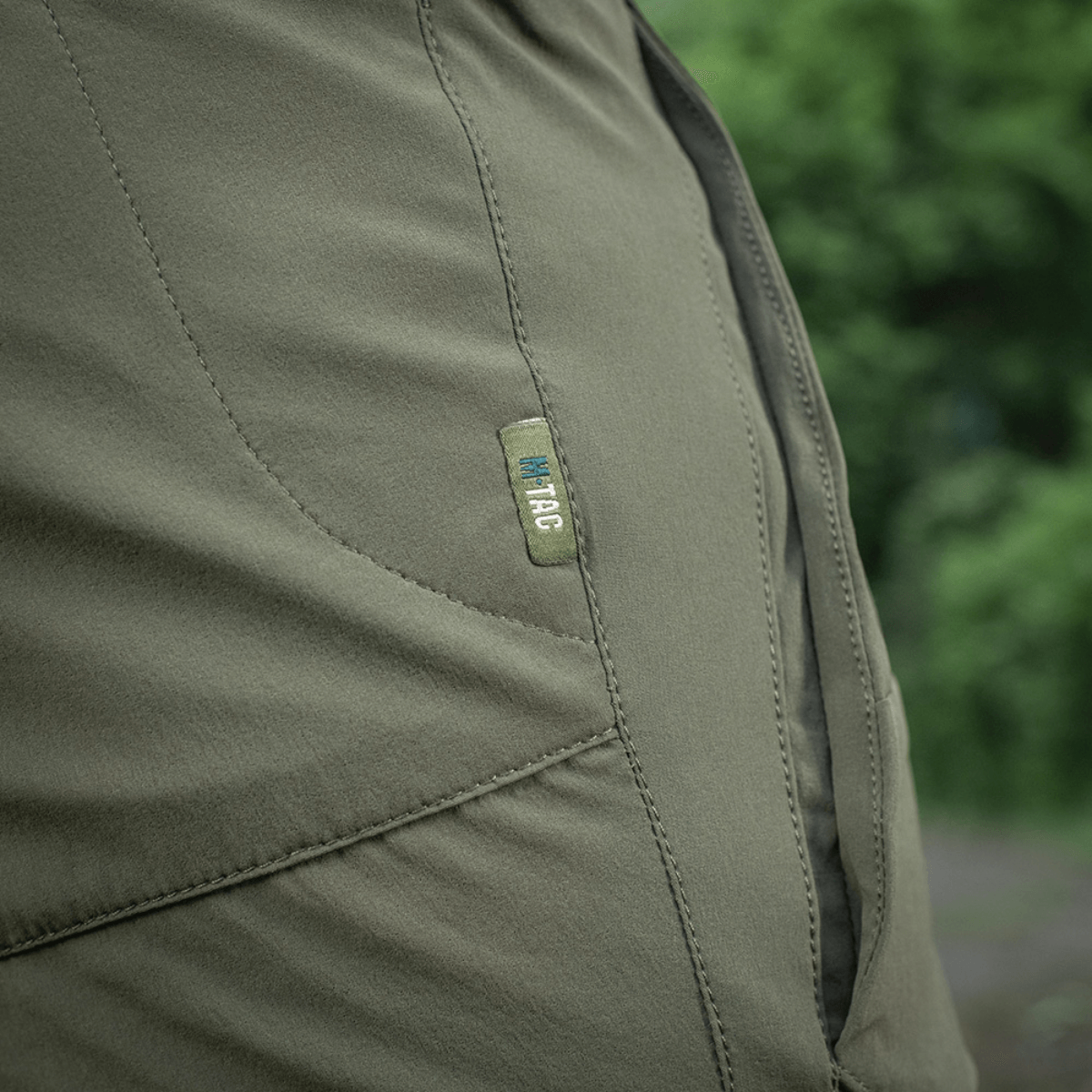 M-Tac Shorts Rubicon Flex tummanoliivinvihreät, erityissuunniteltu cargotasku kesäksi, valmistettu 85% nylonista ja 15% spandexista.