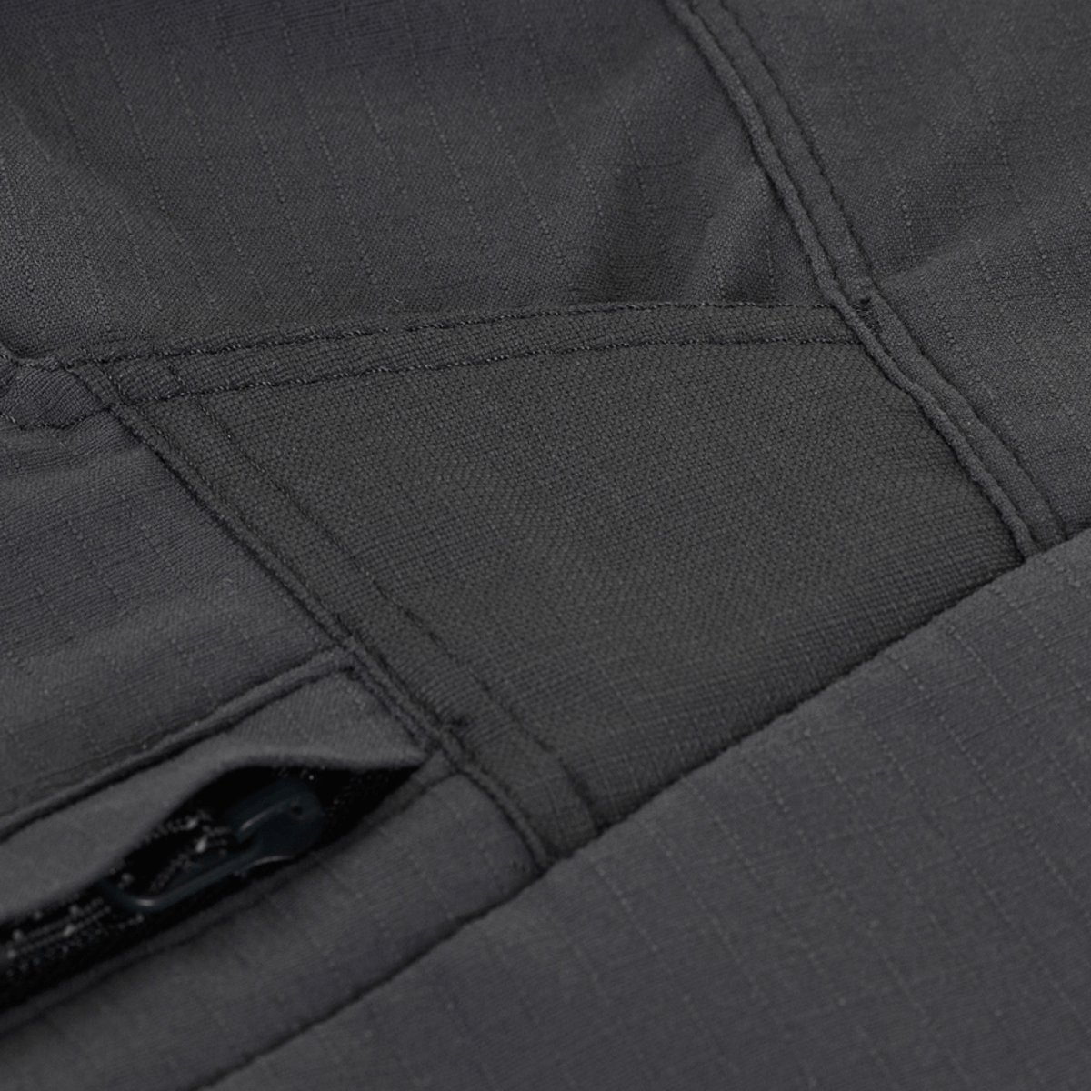 Lähikuva M-Tac Aggressor Summer Flex Shorts -housuista, Flex Rip-Stop -kangas näyttää vetoketjun ja saumat.