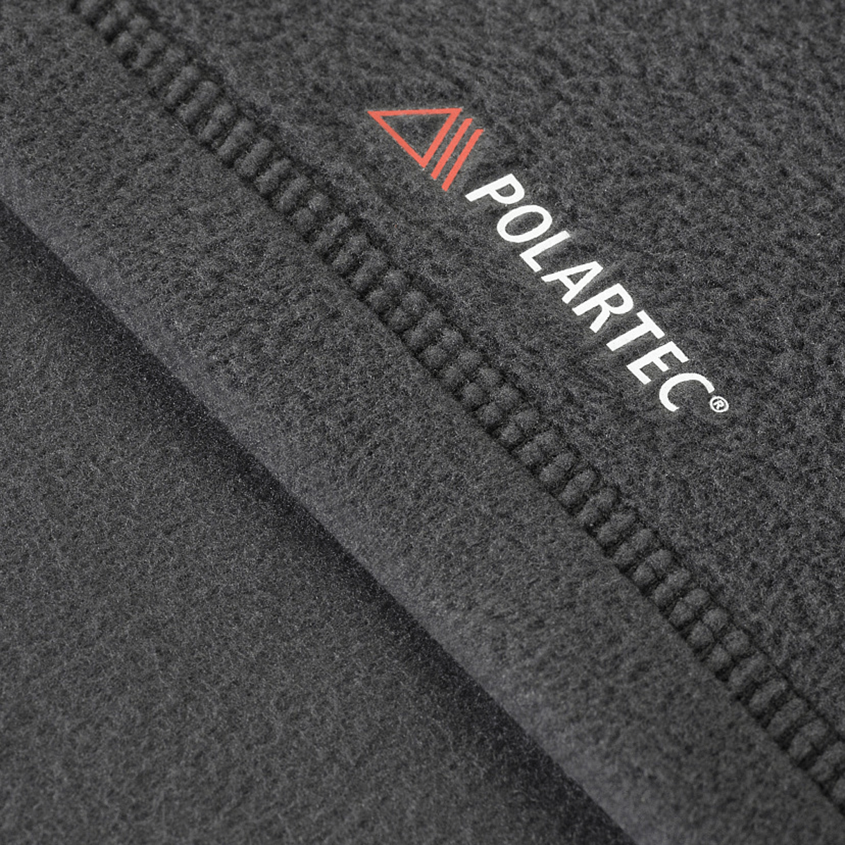 Lähikuva M-Tac Delta Polartec -fleece-takin Polartec® Micro Series -fleece-kankaasta.