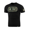 M-Tac T-Shirt Logo, camokuvio ja slogan "Born by Revolution – Hardened by War" mustalla taustalla.