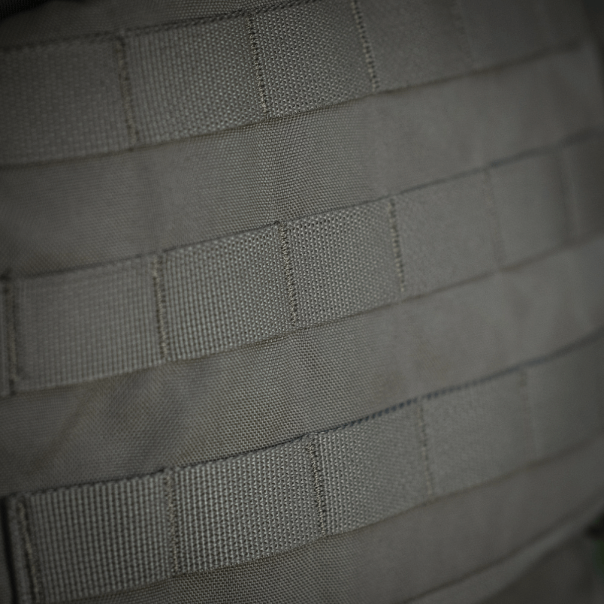 Yksityiskohta M-Tac War Belt ARMORista MIL-SPEC MOLLE-webbingillä ja kestävässä Cordura 500D:ssä, ihanteellinen taktiseen varustukseen.