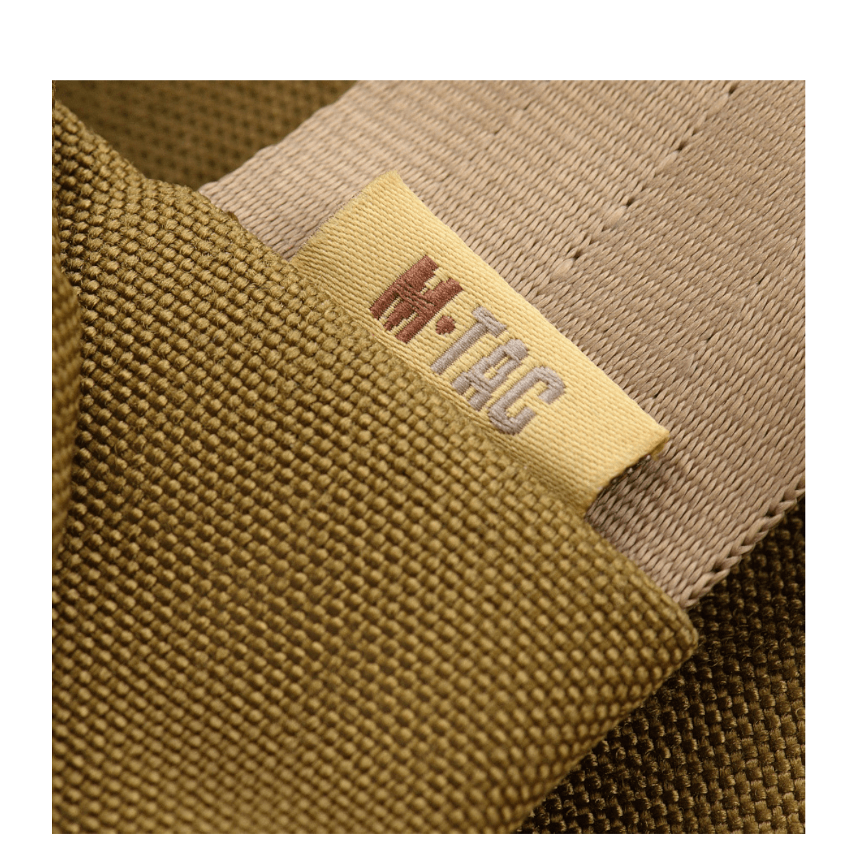 M-Tac Carry Sling Taske Elite Gen.IV med Velcro, khaki, tiheästi kudottu nylon, selvästi kirjailtu merkkilogo, galleria, sijainti 1.