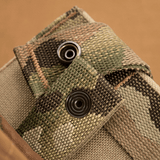M-Tac Mag Drop Pouch Elite maastokuvioinnilla ja tukevilla napituksilla nopeaan pääsyyn ja turvalliseen kiinnitykseen.