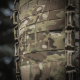 Lähikuva M-Tac Rygsæk Large Gen.III Elite -repusta camouflagedesignilla, näyttää kestävän Cordura-rakenteen ja taktiset ominaisuudet.