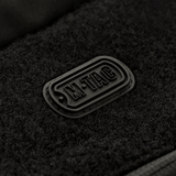 M-Tac Rygsæk Gen.II Elite Large, musta logo keskipisteessä, valmistettu kestävästä Cordura-kankaasta kestävyyttä ja toimivuutta varten.