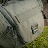 Lähikuva M-Tac Toilettaske Elite Gen.II sotilaanvihreänä, Cordura-materiaali.