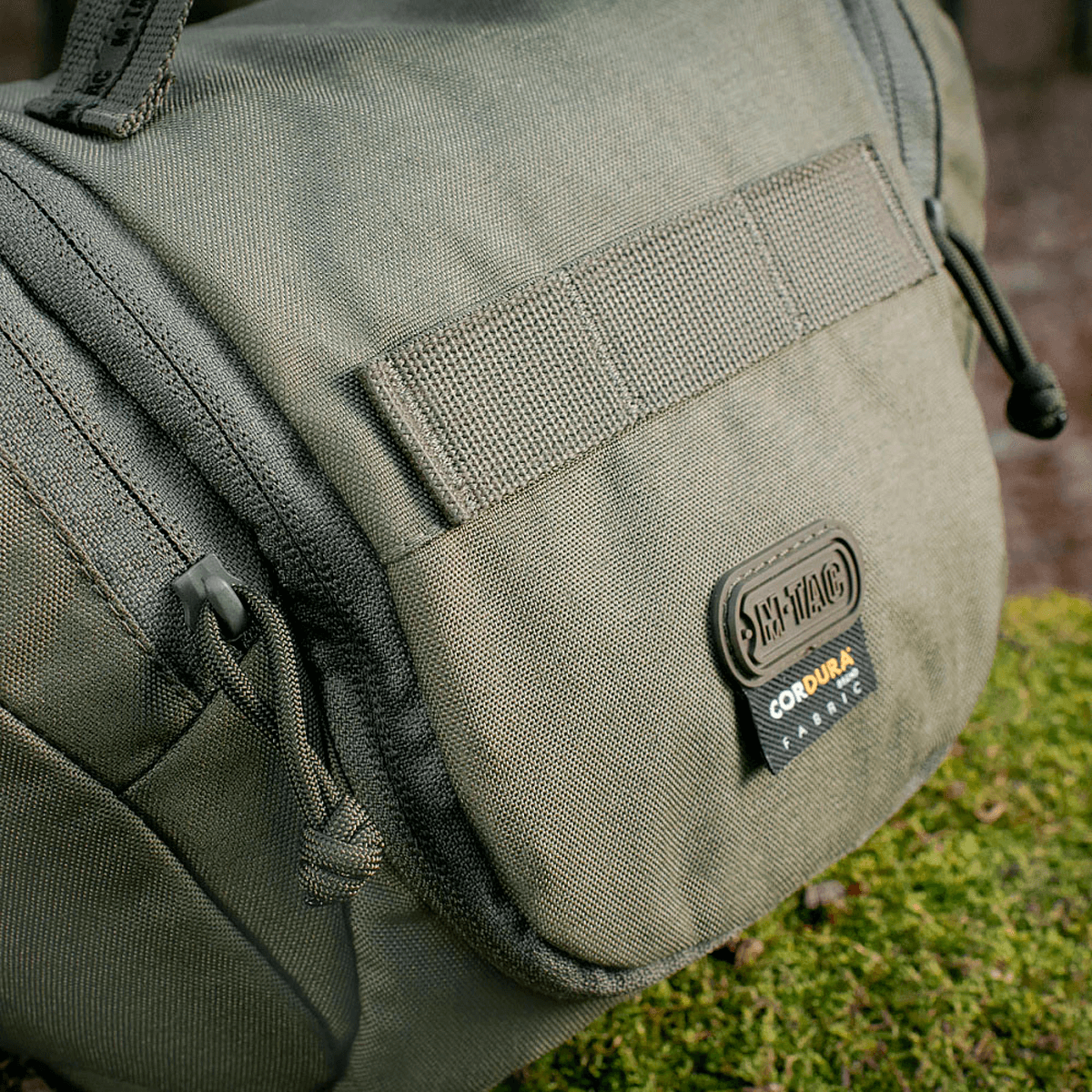 Lähikuva M-Tac Toilettaske Elite Gen.II sotilaanvihreänä, Cordura-materiaali.