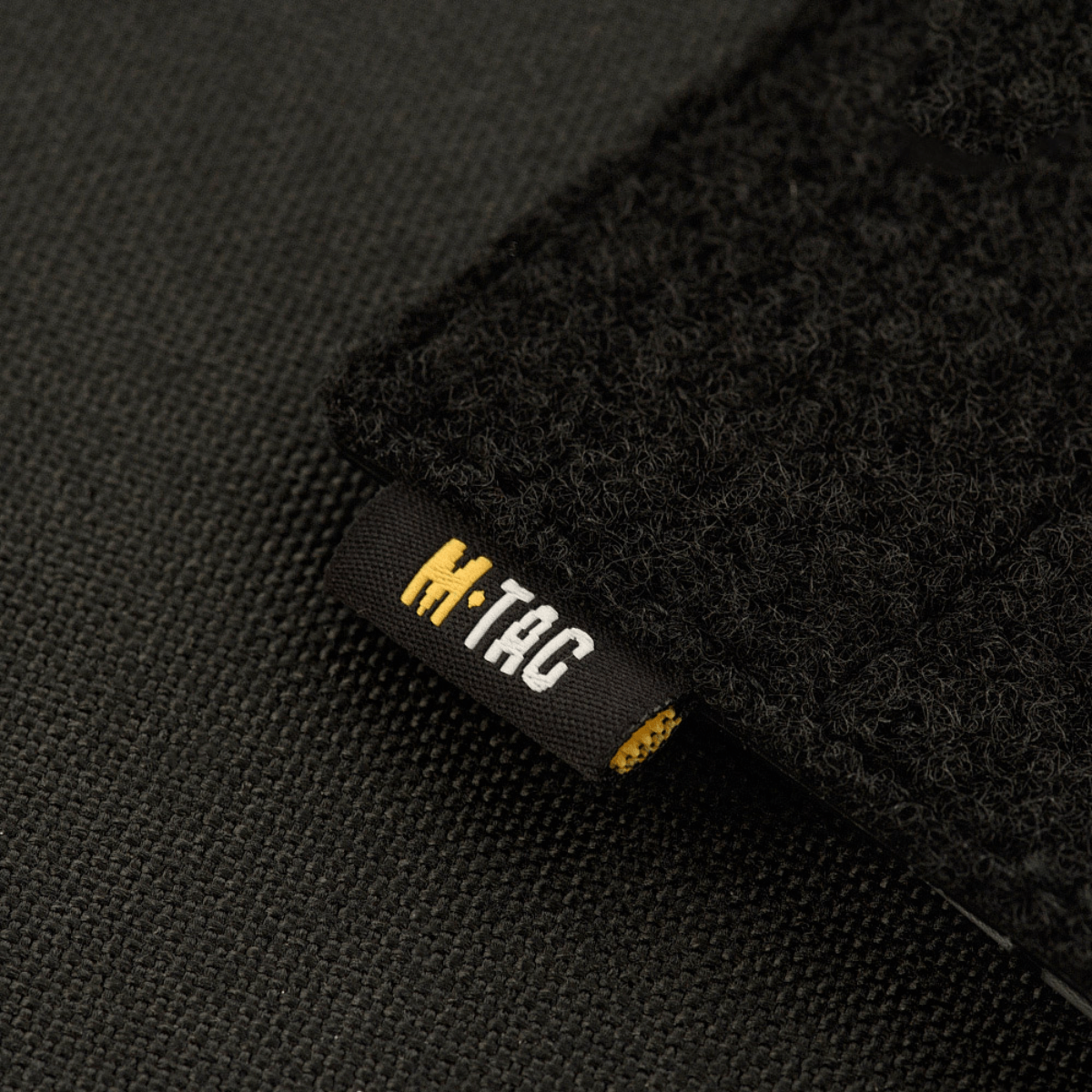 M-Tac Taktisk Morale Patch Display Board Hook and Loop Molle 120x85 MOLLE-kiinnityksellä ja muovipohjalla merkeille.
