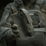M-Tac Tourniquet Pouch Elastisk VELCRO Gen.II plate carrierissa, VELCRO-lukitus, taktinen muotoilu Cordura 500D:stä ja Texcel-hihnoilla