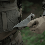 M-Tac Tourniquet Pouch Elastisk VELCRO Gen.II kiinnitetty VELCRO-paneeliin, nopea pääsy tourniquetiin taktillisessa tilanteessa