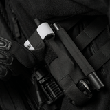 M-Tac Elastisk Tourniquet Pouch Molle Gen.III laukku taktisen liivin päällä.