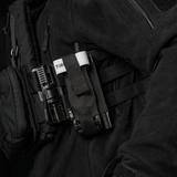 M-Tac Elastisk Tourniquet Pouch Molle Gen.III kiinnitettynä taktiseen liiviin.