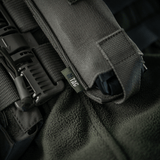 M-Tac Elastinen Tourniquet Pouch Molle Gen.III Cordura Squadron -materiaalista, 15x5 cm, kuminauhalla tourniquetille ja kynälle.