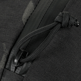 Lähikuva M-Tac Satellite Magnet -laukusta Elite Hex, jossa vahva vetoketju ja kestävä Cordura-materiaali.
