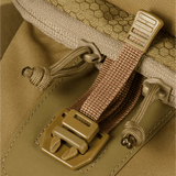 Yksityiskohta M‑Tac Cross Bag Elite Hexistä, Cordura 500 -materiaali, WJ-sovittimet ja ruskeat YKK-vetoketjut.