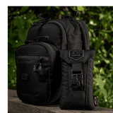 M-Tac Smartphone Lomme Elite Large Hex -mustalaukku kestävästä CORDURA HEX -materiaalista WJ-magneettisoljella, sopii 6,5 tuuman älypuhelimelle.