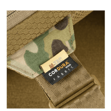 Materiaaliyksityiskohta M-Tac Sling Pistoltaske Elite Hexistä Cordura-kankaalla ja säädettävällä hihnalla.