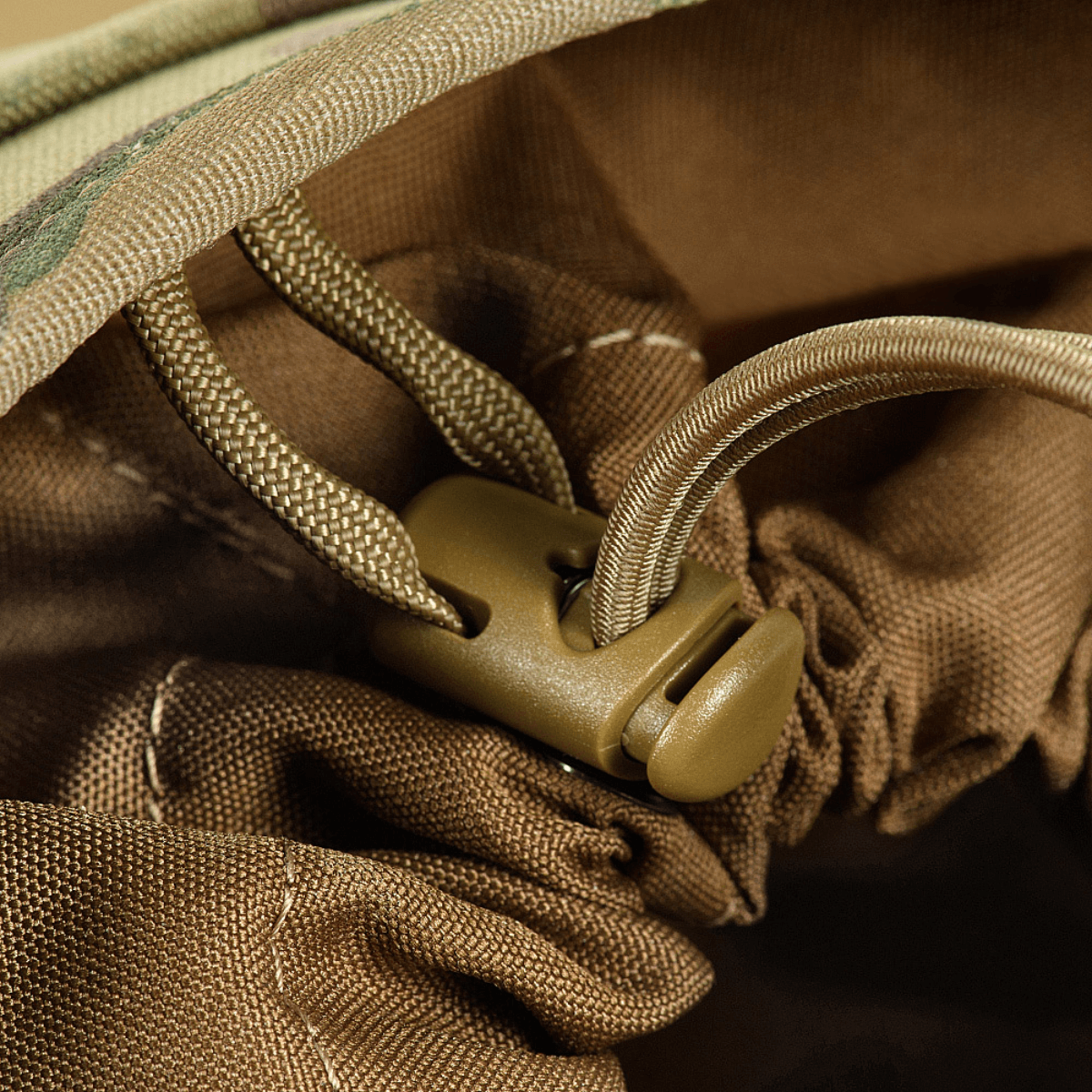 M‑Tac Magasinsæk Dump Pouch Lite Elite quick-pull-sulkimella turvalliseen säilytykseen. Kestävä Cordura 500D, sopii MOLLE-kiinnitykseen.