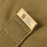 M-Tac Pouch Sukharka Gen.3 XL Cordura 500D -kankaasta, näyttää M-Tac-logoetiketin ja tekstuurin yksityiskohdat.