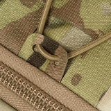 Lähikuva M-Tac STURM Elite -repusta camo-kuvio, Cordura-materiaali ja YKK-vetoketju.