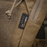 Lähikuva M-Tac Large Elite Gen.II -olkalaukusta Cordura 500D -materiaalissa, näkyvällä CORDURA-labelilla.