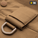 Lähikuva M-Tac Shorts Aggressor Shortista D-renkaalla ja kiinteällä vyölenkillä joustavasta polycotton Flex rip-stop -materiaalista.