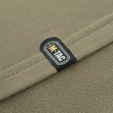 Lähikuva M-Tac Pullover 4 Seasons -venyvästä kangasetiketistä, sopii arki- ja taktiseen käyttöön ympäri vuoden