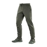 M-Tac Stealth Cotton -urheiluhousut oliivinvihreänä, 100% puuvillaa, kuminauha vyötäröllä ja sivutaskut, sopivat juoksuun ja arkeen.
