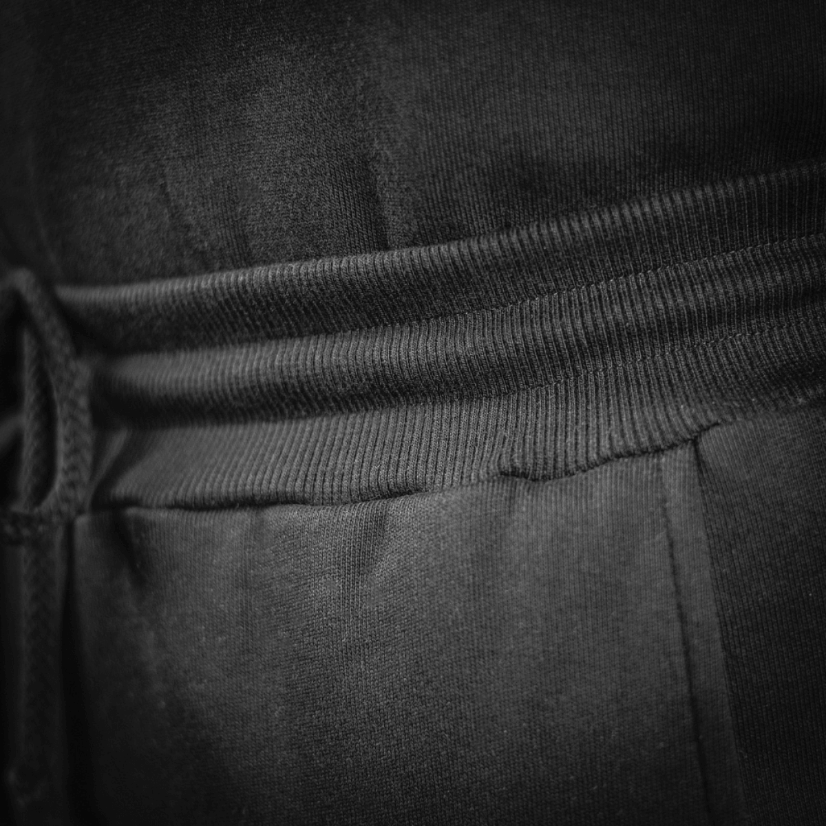 M-Tac Bukser Cotton Classic, mustat, yksityiskohta vyötäröstä ja nyöristä, 100% puuvillaa.