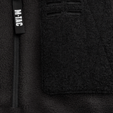 Yksityiskohta M-Tac Alpha Microfleece Jakke Gen.II -takista vahvistetulla fleecellä ja vetoketjulla, täydellinen taktiseen käyttöön kylmällä säällä.