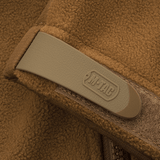 Vahvistetun fleecen ja Oxford-nylonin yksityiskohta M-Tac Alpha Microfleece takki Gen.II:stä.