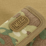 Lähikuva M-Tac Pung Elite Gen.II:stä, maastokuvio ja logo, valmistettu kestävästä Cordura 500D:stä.