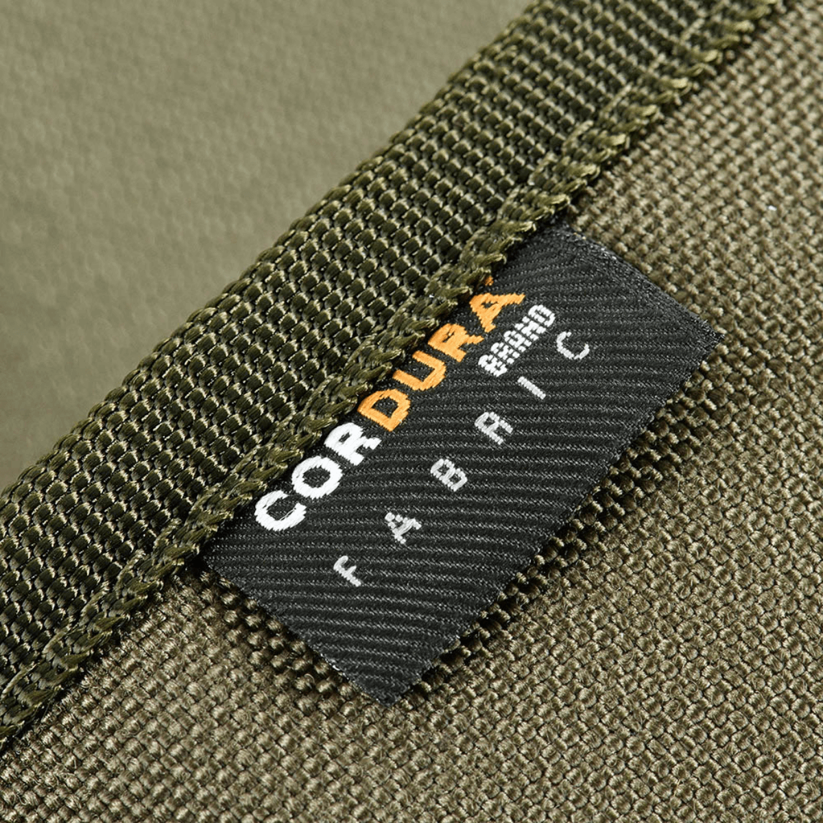 M-Tac Pung Elite Gen.II valmistettu kestävästä Cordura 500D-kankaasta, lähikuva merkkilapusta.