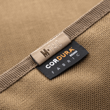 M-Tac Patch Panel Elite kestävästä 1000D CORDURA® -kankaasta ja M-Tac-logolla, sopii taktisten housujen taskuihin.