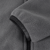 Yksityiskohta M-Tac Nord Polartec -fleecetakista, valmistettu Polartec® 200 Series -fleecestä, näyttää materiaalin ja vetoketjun.