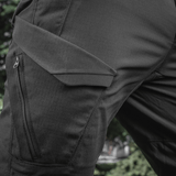 M-Tac Aggressor Summer Flex Shorts Rip-Stop -kankaalla, seitsemän taskua ja säädettävä vyötärö, täydelliset taktiseen käyttöön ja ulkoiluun.