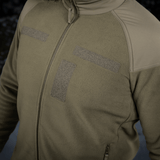 M-Tac Combat Fleece Polartec -takki tuuli- ja joustopaneeleilla, YKK-vetoketjut ja tarrapaneelit, taktiseen käyttöön.