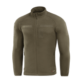 M-Tac Combat Fleece Polartec -takki oliivinvihreänä, YKK-vetoketjut ja tarrapaneelit, sopii taktiseen ja arkipukeutumiseen.