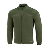 M-Tac Combat Fleece Polartec -takki oliivinvihreänä, Velcro-paneelit ja tuulisuojat, täydellinen taktiseen ja arkikäyttöön.