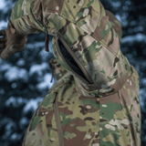M-Tac Alpha Gen.IV Pro Primaloft -talvitakki Multicam-kankaalla, näyttää tuuletusominaisuutta, sopii äärilämpötiloihin.