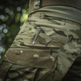 M-Tac Shorts STURM Gen.II Nyco Extreme metsämaastokuvio ja taskudetaljit, ihanteelliset taktiseen ja ulkoilmakäyttöön.