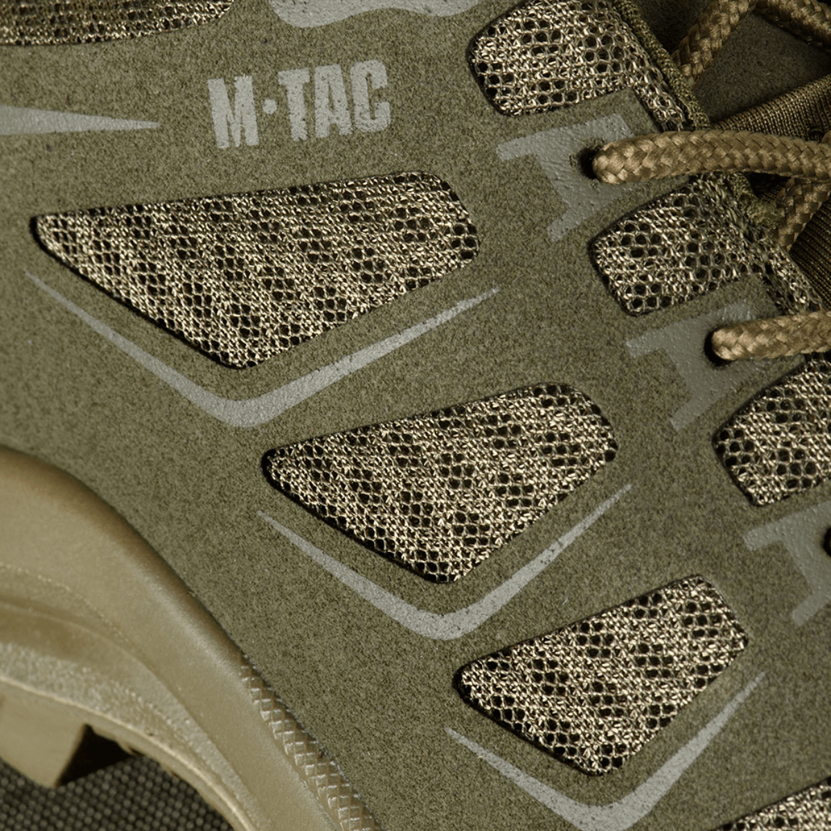 Yksityiskohta M-Tac Tactical Sneakers IVA:sta – hengittävä mesh ja synteettinen nubuck suojaa ja tuuletusta, sopii ulkoiluun.