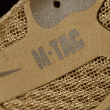 Yksityiskohta M-Tac Tactical Sneakers IVA:sta – tuuletettu mesh ja synteettinen nubuck suojaa ja mukavuutta varten.