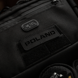 M‑Tac Patch Poland End-to-End 25x80 -tarra laserkaiverretulla tekstillä, valmistettu Cordura 500D -materiaalista. Kiinnitetään tarralla.