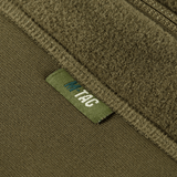 Lähikuva M-Tac Polartec Sport Fleecejakke vihreänä, näkyvällä logolla