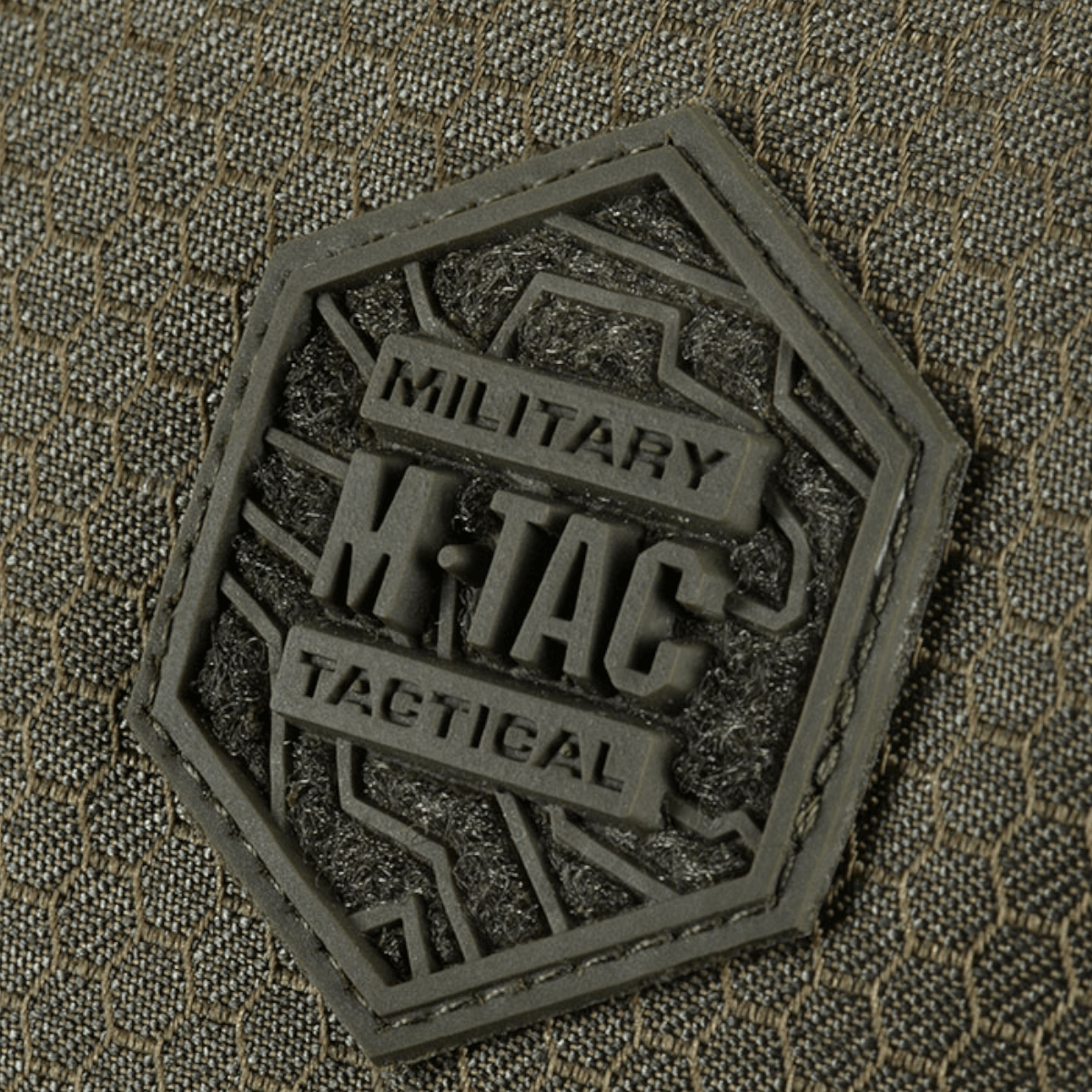 M-Tac Konvert Taske Elite, lähikuva merkistä Cordura Hex 1000D.