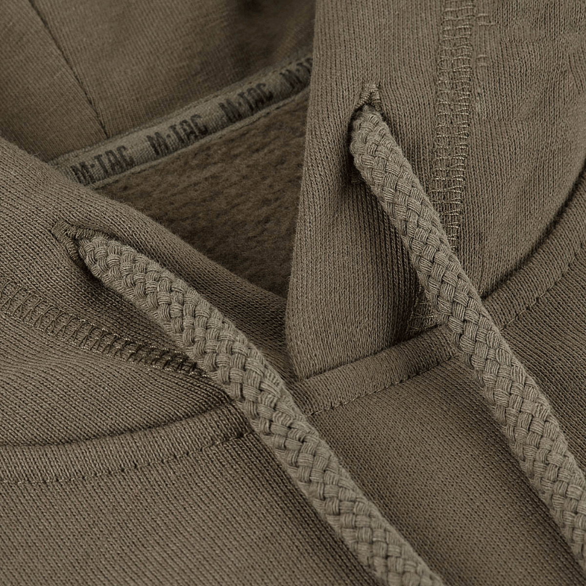 M-Tac Cotton Raglan -huppari nauhoilla, 100 % puuvillaa mukavuutta ja monikäyttöisyyttä varten. Raglanhihat antavat täyden liikkumisvapauden.