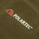 M-Tac Anatominen Tube Scarf Polartec-nyörillä, Polartec-logo fleece-kankaassa.